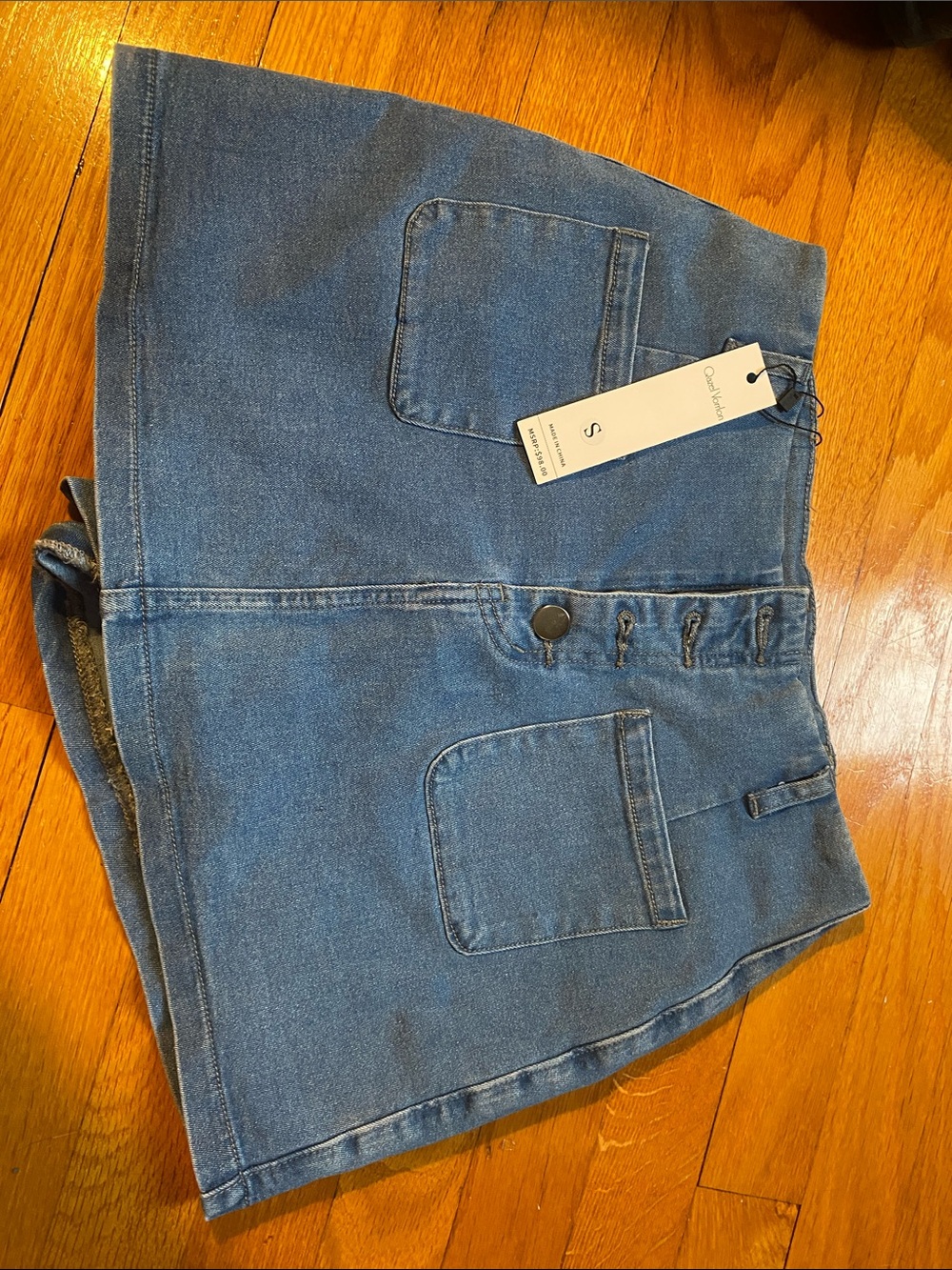 Qazel Vorrlon Women's Blue Denim Mini Skort with Front Patch Pockets